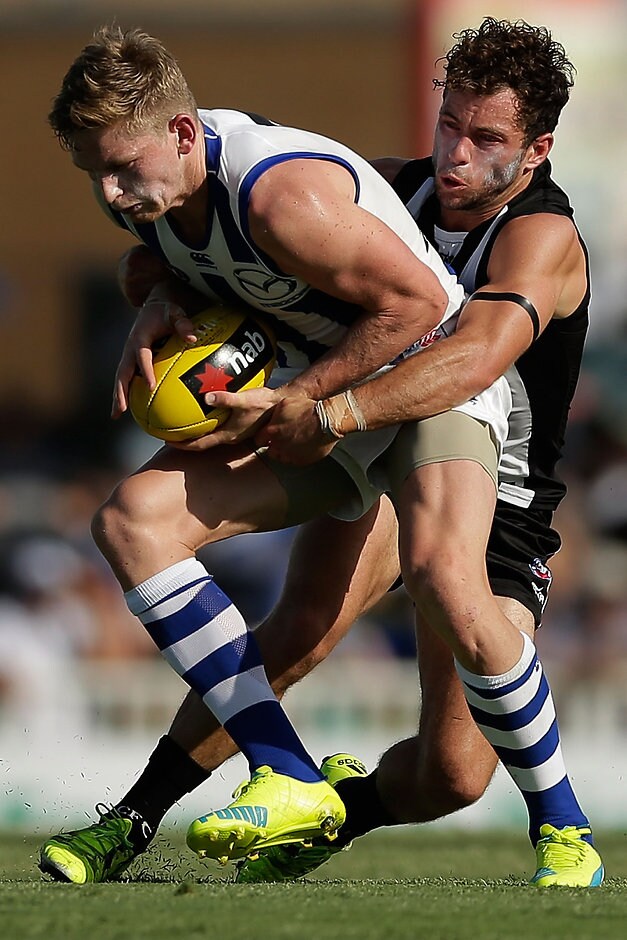 AFL 2016 NAB Challenge - North Melbourne v Collingwood Jarryd Blair locks up Jack Ziebell in a tackle on Saturday - ${keywords}